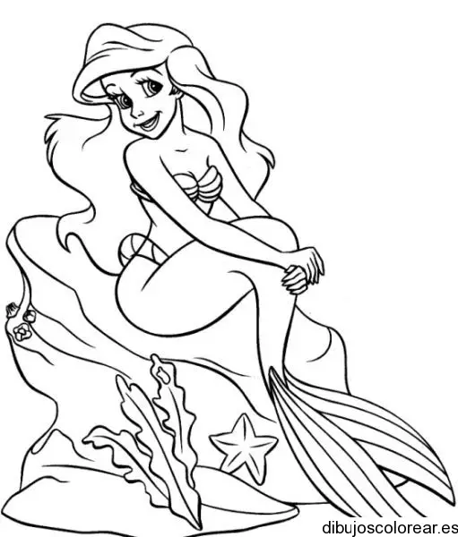 Dibujo de Sirenita en una roca